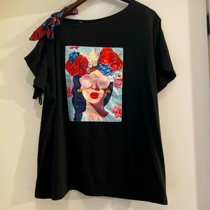 A top that was a ribbon that is top of the shoulder which goes off the shoulder.